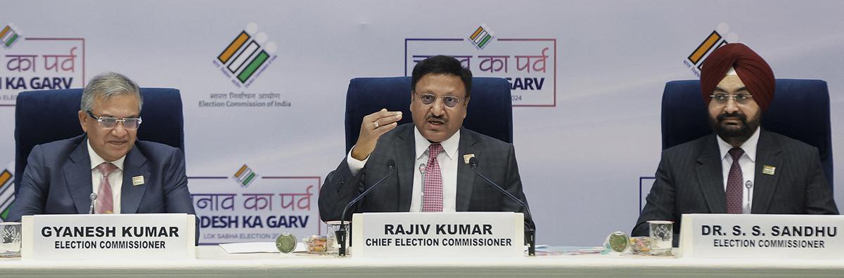 India’s Chief Election Commissioner Rajiv Kumar , Election Commissioners Gyanesh Kumar and S. S. Sandhu look on during a press